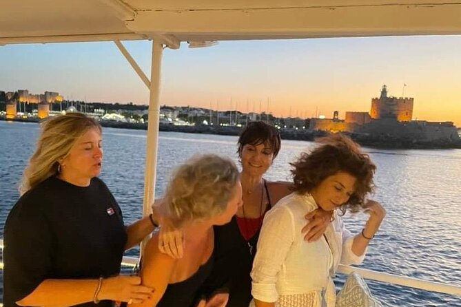 Rhodes Sunset Cruise - Swim and Dine w/ Live Music & Sunset! - Dinner on a Boat: Greek Buffet, Wine Included, and Real-Time Relaxation