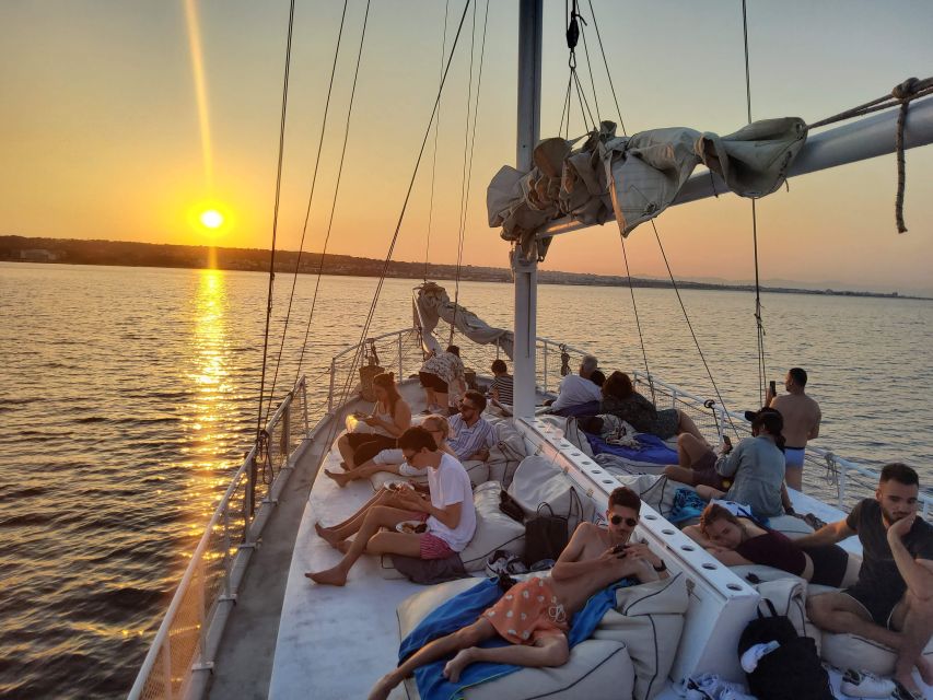 Rhodes: Sunset Cruise w/ Gourmet Buffet, Drinks & Live Music - The sunset moment: horns, music, and the right kind of drama