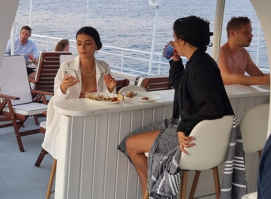Rhodes: Sunset Cruise with Live Music, Wine & Greek Buffet - Key highlights at a glance