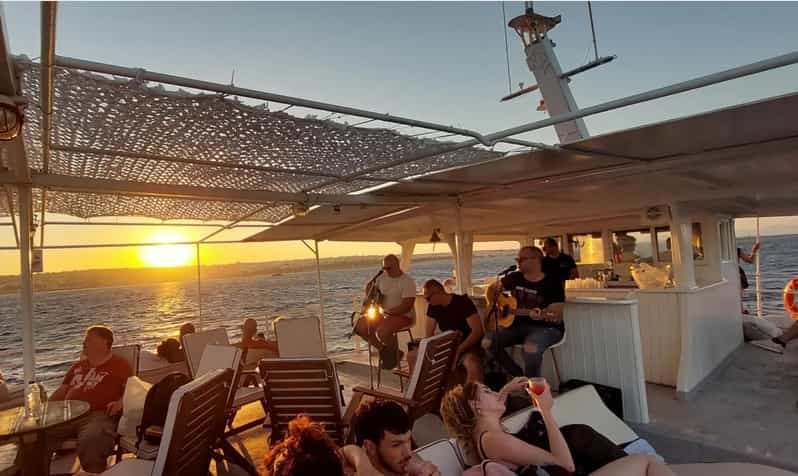 Rhodes: Sunset Cruise with Live Music, Wine & Greek Buffet - Should you book this Rhodes sunset cruise?