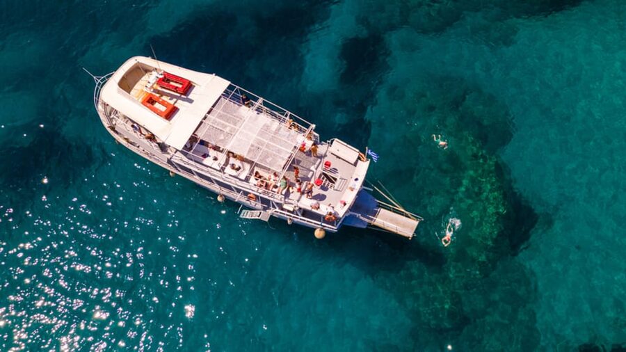 Rhodes: Sunset Cruise with Live Music, Wine & Greek Buffet - Dinner buffet and the wine flow on Romantika Dreams