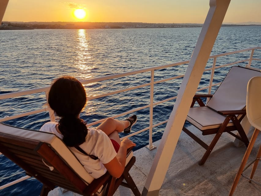 Rhodes: Sunset Cruise with Live Music, Wine & Greek Buffet - Who should book this cruise, and who should skip it