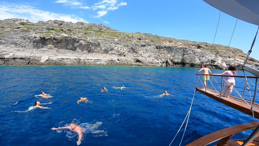 Rhodes Town: Sunset Boat Cruise with Drinks & Snacks - Yacht cruising time: why those in-between sailing segments matter