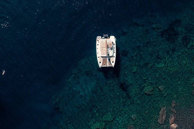 Romantic Sunset Catamaran Caldera Cruise incl. Meal & Drinks - Hot Springs and Snorkeling: What Swimming Is Like in Real Life