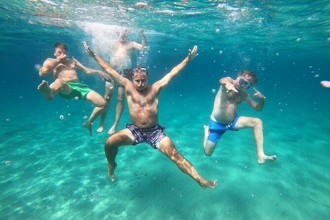 Sail the Athenian Coastline on a Catamaran with Meal & Wine - Stop 1, Nisís Idhroúsa: the tiny island swim that resets your day