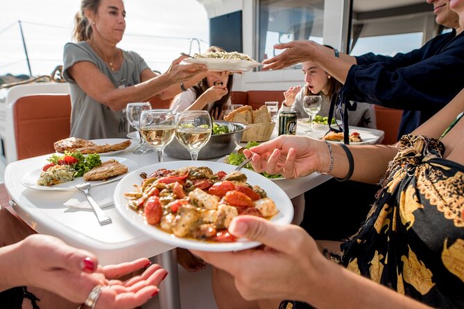 Sail the Athenian Coastline on a Catamaran with Meal & Wine - Watersports options: snorkeling gear, SUP, and kayak time