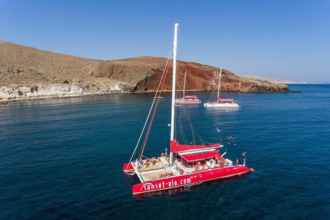 Sailing Catamaran Cruise in Santorini with BBQ, Drinks and Transfer - The sailing route: volcano and caldera views from the west coast