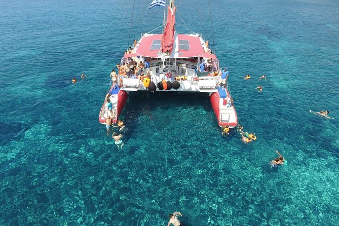 Sailing Catamaran Cruise in Santorini with BBQ, Drinks and Transfer - Snorkeling gear and safety: what to pack and how to choose your comfort level