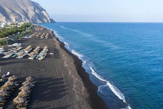 Santorini 8-Hour Private Tour with Hotel & Cruise Port Pickup - Red Beach and the Lighthouse: volcanic color and cliff-edge drama