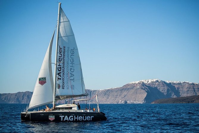 Santorini Adventurous Catamaran Experience with Snorkeling - White Beach: The Boat-Only Beauty Moment