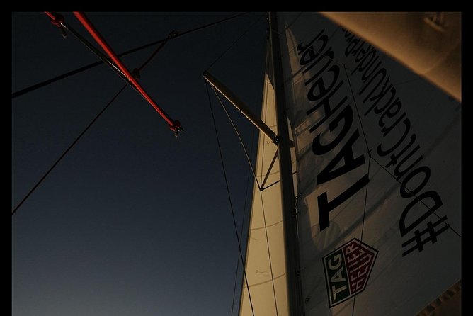 Santorini Adventurous Catamaran Experience with Snorkeling - Pass the Black Mountain and Indian Rock
