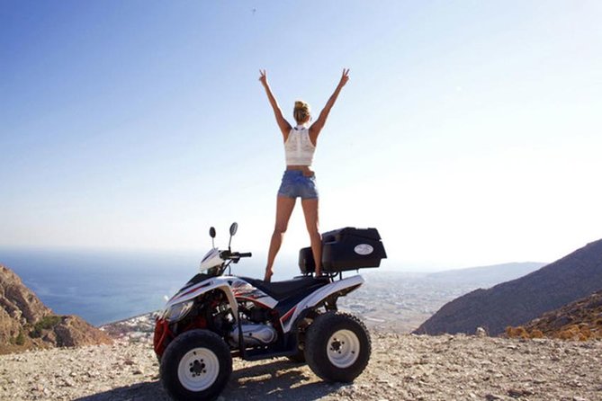 Santorini ATV-Quad Experience: Off-Road Adventure & Hotel Pickup - Riding Through Vineyard Roads Toward Megalochori