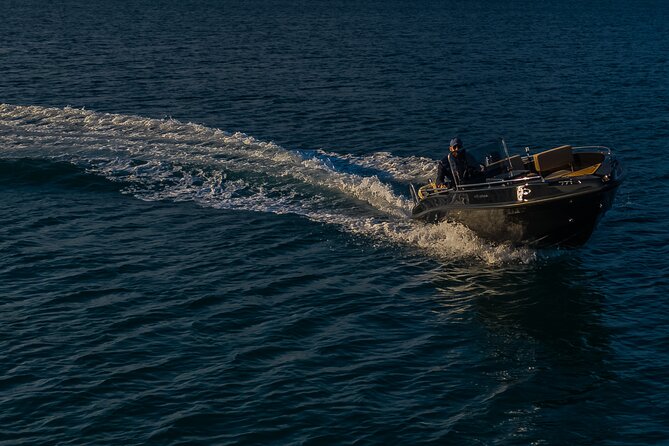 Santorini Boat Rental: License Free and Full or Half Day Options - The Safety Brief That Makes Self-Drive Feel Real