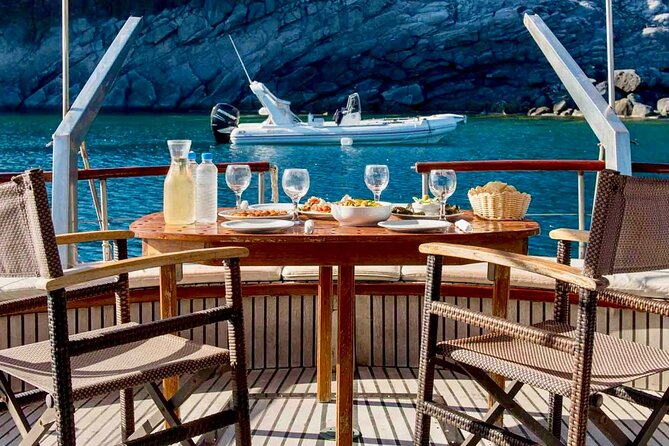 Santorini Caldera Day Traditional Cruise with Meal and Drinks - Why this caldera cruise works: Santorini’s cliffs, beaches, and towns from sea level
