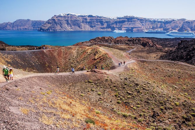Santorini Caldera Morning Cruise With King Thiras Boat - Sailing below Oia on the way back: photos without the sunset crush