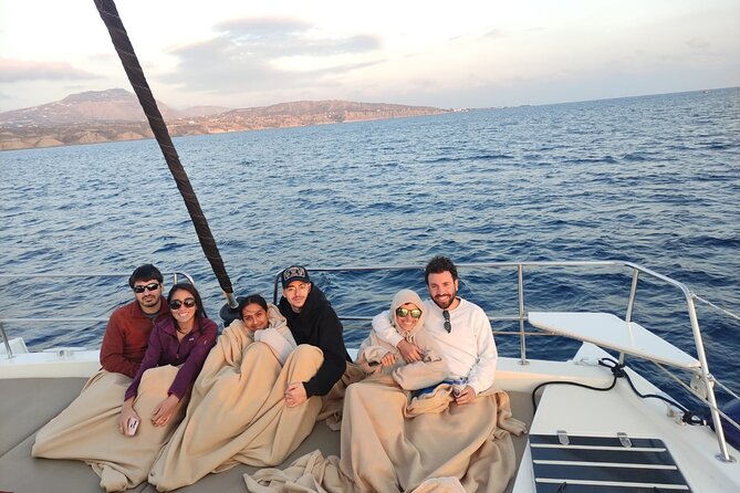Santorini Caldera Panorama Winter Cruise All Inclusive - The black-and-stone Santorini moments: Mesa Pigadia and sailing past the volcano