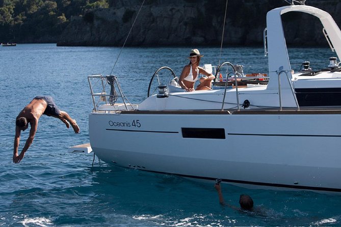 Santorini Caldera Private Sailing Boat Cruise - Therasia island: clear water, goggles on, and sun time