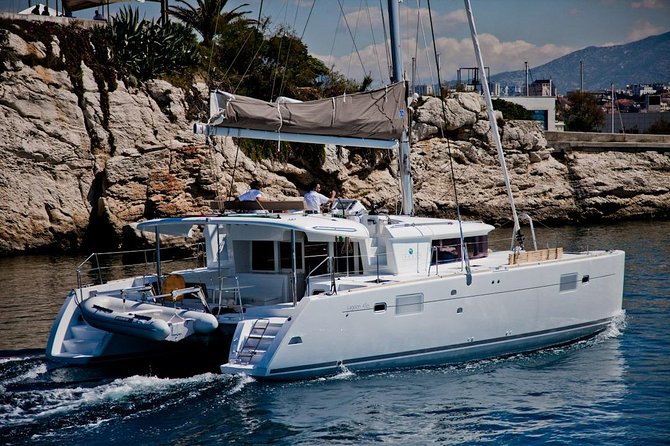Santorini Caldera Sailing Tour with BBQ Lunch and Drinks - Snorkeling, Swimming, and Motion-Sickness Tips