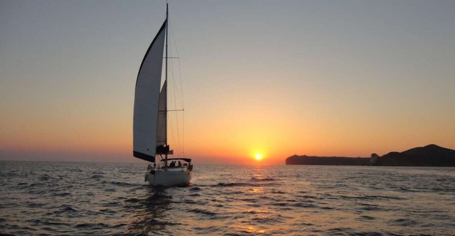 Santorini Caldera: Sunset Sailing Cruise with Meal - Entering the Santorini caldera from Vlychada Marina