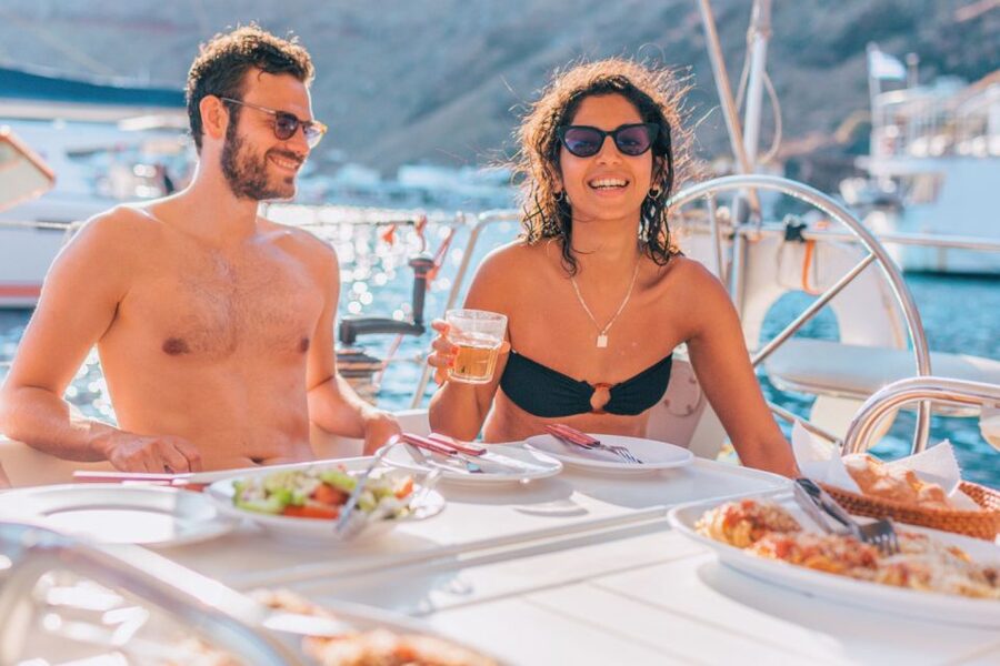 Santorini Caldera: Sunset Sailing Cruise with Meal - Mesa Pigadia swim and snorkel time