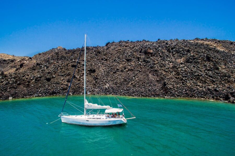 Santorini Caldera: Sunset Sailing Cruise with Meal - The onboard BBQ seafood dinner and local wine
