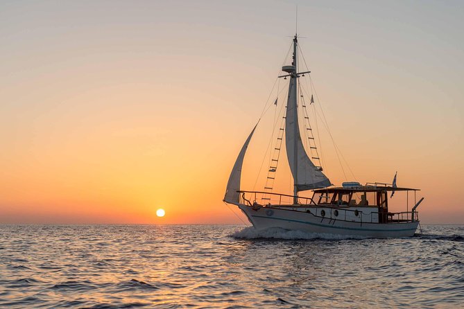 Santorini Caldera Sunset Traditional Cruise with Meal and Drinks - Pickup timing, mobile tickets, and how the day actually flows
