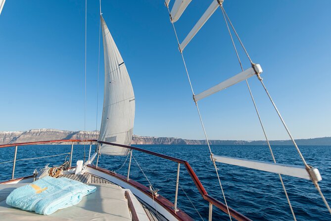 Santorini Caldera Sunset Traditional Cruise with Meal and Drinks - Mesa Pigadia and the rock formations: fast scenery, then you’re back on the water