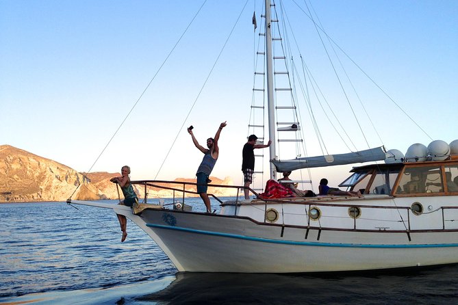 Santorini Caldera Sunset Traditional Cruise with Meal and Drinks - Thirassia: the fishermen’s island swim and the best excuse for a Greek lunch