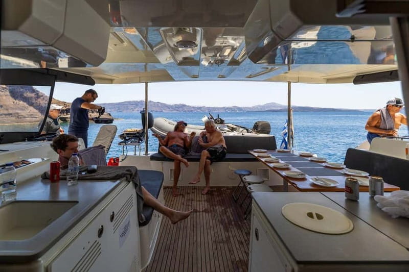 Santorini: Catamaran Cruise with Fresh Meal & Open Bar - Akrotiri Lighthouse: a useful stop for views and a breather between swims