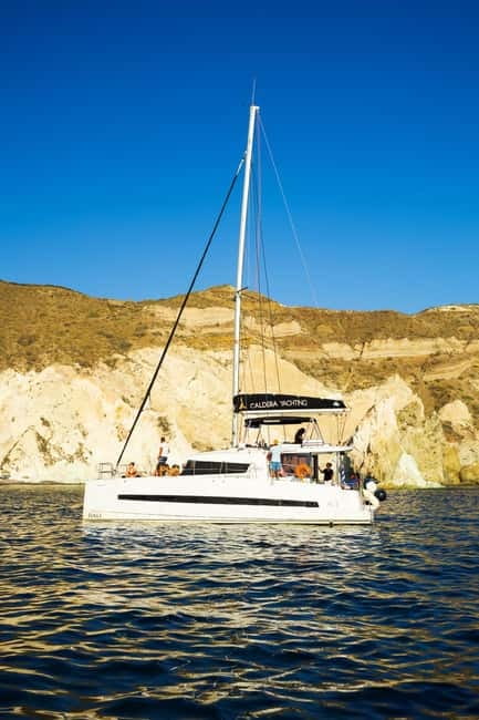 Santorini: Catamaran Cruise with Fresh Meal & Open Bar - Volcanic hot springs: what geothermal swimming feels like