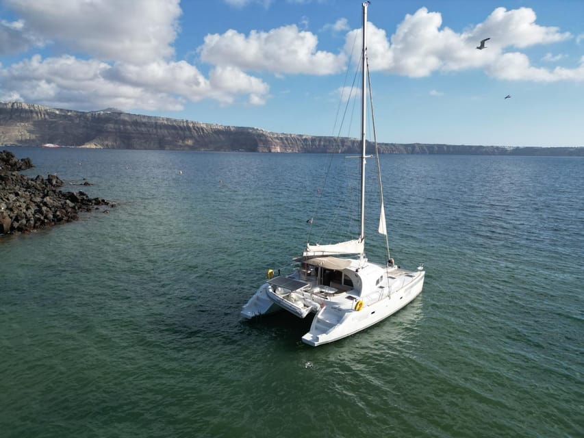 Santorini: Catamaran Cruise with Greek BBQ and Drinks - Timing, sea conditions, and where you’ll end up afterward