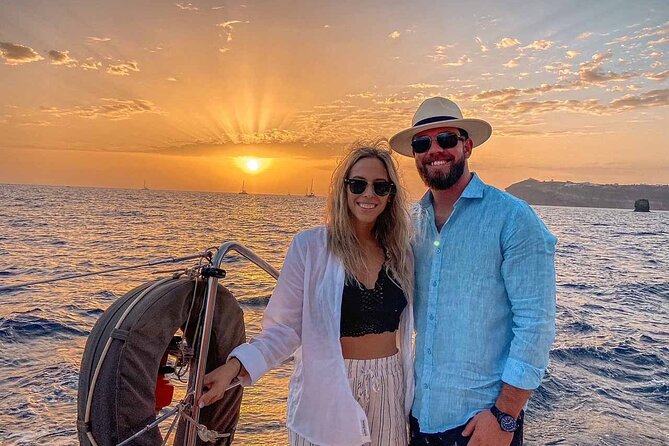 Santorini Catamaran Cruise with Greek Meal, Open-Bar and Sunset - Red Beach, White Beach, and the caldera photos that feel impossible from land