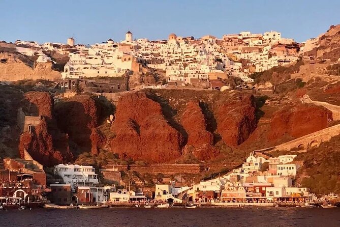 Santorini Catamaran Cruise with Greek Meal, Open-Bar and Sunset - Luxury extras: seeing Oia and Ammoudi without the walking tour pressure