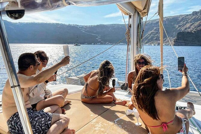 Santorini Catamaran Cruise: with Lunch, BBQ, Open Bar, Transfers - Mesa Pigadia Beach: a real swim stop plus Greek lunch onboard