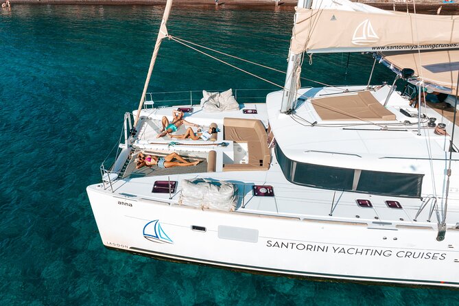 Santorini Catamaran Cruise: with Lunch, BBQ, Open Bar, Transfers - Pickup and transfers: less stress, more time for the day