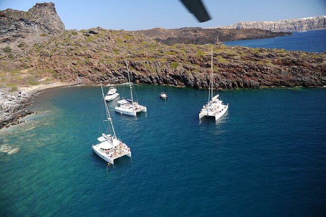 Santorini Classic Catamaran Cruise with BBQ, Drinks and Transfers - Volcano views and the calm rhythm before BBQ