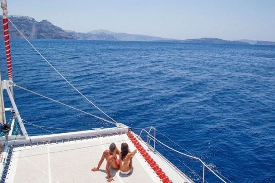 Santorini: Dream Catcher 5-hour Sailing Trip in the Caldera - Indian Head Mountain and the Venetian Lighthouse, then you enter the Caldera