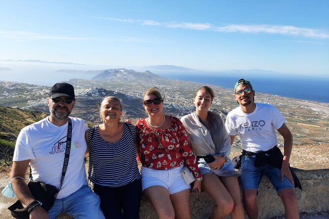 Santorini First-time Visitors Private Tour with Wine Tasting - The extra village moments, cave houses, and photo angles