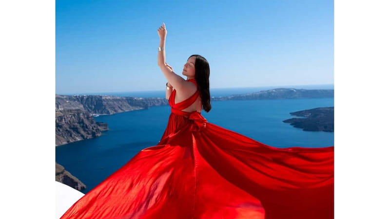 Santorini: Flying Dress Photoshoot with Edited Photos - Where You Shoot: Imerovigli vs. Oia (And What It Changes)
