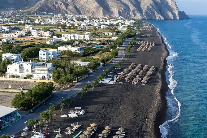 Santorini Full Day Trip by Santo Luxury Escape - Stop 5: Red Beach in Akrotiri, volcanic color on full display