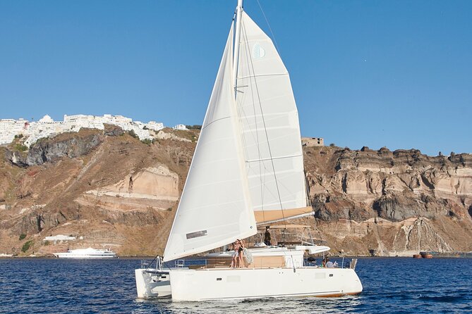 Santorini Gold Catamaran Cruise with BBQ, Drinks and Hotel Pickup - Mesa Pigadia Beach: the well-kept stop that pairs with your meal