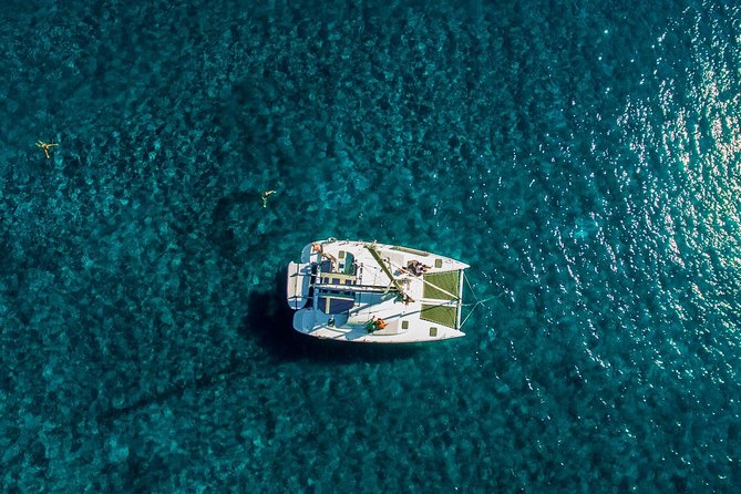 Santorini Half Day Catamaran Private Cruise incl. Meal, Drinks & Free Transport - Why a private half-day catamaran works so well in Santorini