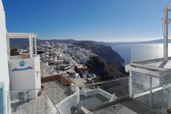 Santorini Local Tour - Oia revisited for the village feel: photos, blue-domed churches, and luxury edges