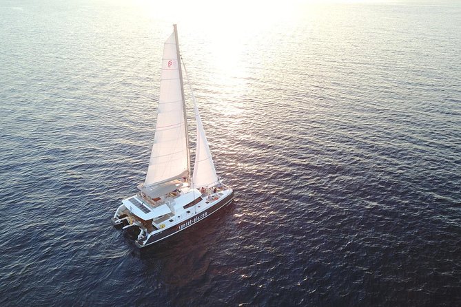 Santorini Luxury Catamaran Day Cruise with BBQ,drinks,transfer - Why this Santorini catamaran day cruise feels calmer
