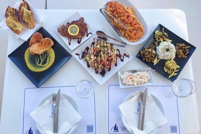 Santorini Luxury Catamaran Day Cruise with BBQ,drinks,transfer - White Beach snorkeling plus BBQ: the best chunk of time