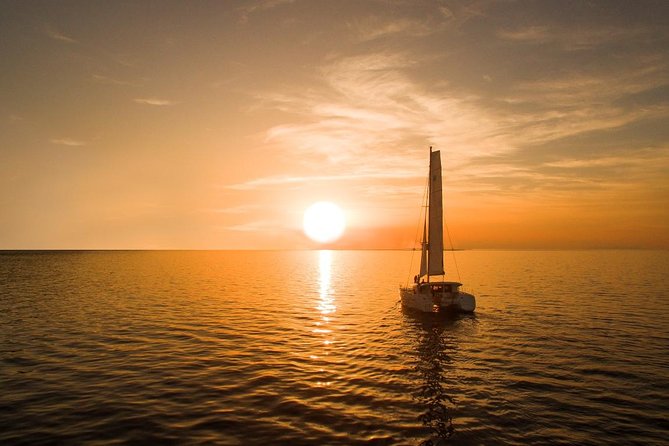 Santorini Luxury Catamaran Sunset Cruise with BBQ, Drink and Transfer - Drinks, BBQ, and the value behind the $157.28 price