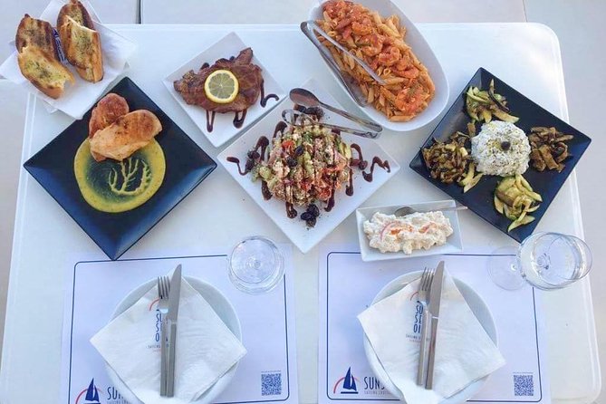 Santorini Luxury Catamaran Sunset Cruise with BBQ, Drink and Transfer - Volcano and Palea Kameni views from the sea