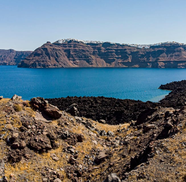 Santorini Port: 3 Hour Cruise to Volcano and Hot Springs - Meeting in Fira Old Port: Getting on Board Without Stress