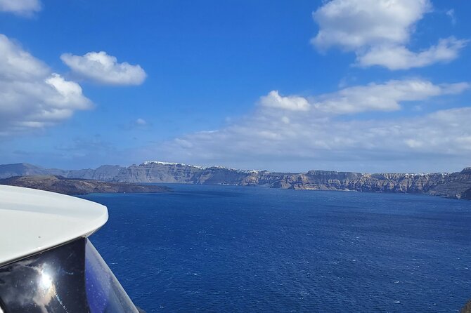 Santorini: Private Transfer from Airport/Port - Flight and ferry tracking, plus the delay protection that matters