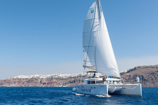 Santorini Small-Group Catamaran Sailing Trip(BBQ,drinks, transfer) - From Hotel Pickup to Marina: How the Catamaran Day Flows